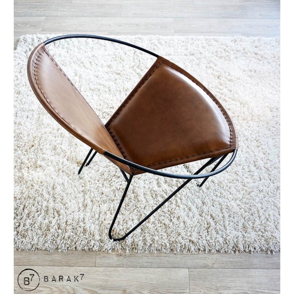 Chaise en cuir papillon