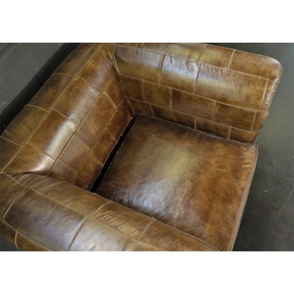 Fauteuil chesterfield en cuir patchwork