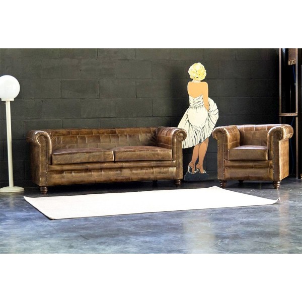 Fauteuil chesterfield en cuir patchwork