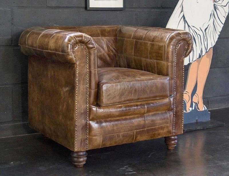 Fauteuil chesterfield en cuir patchwork