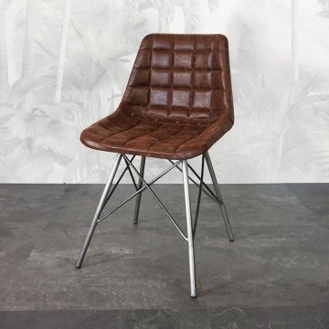 Chaise industrielle en cuir gaufré