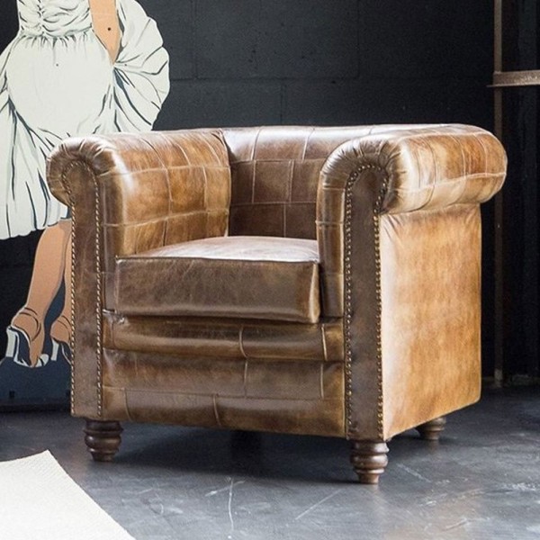 Fauteuil chesterfield en cuir patchwork