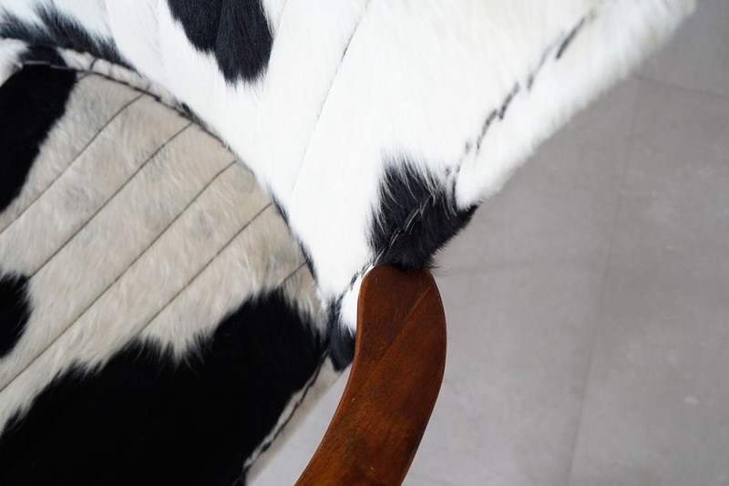 Fauteuil en peau de vache véritable noir/blanc